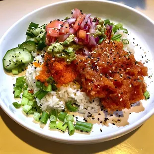 Sushi Bowl with spicy tuna tartare, salmon sashimi, crab salad, avocado, cucumber, scallions, tobiko