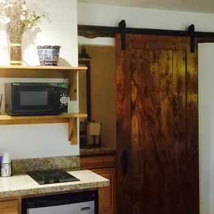 Love the barn door. And the word clean is an understatement.