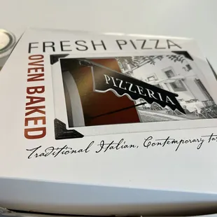 a pizza box on a table