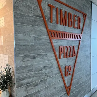 a sign for timber pizza