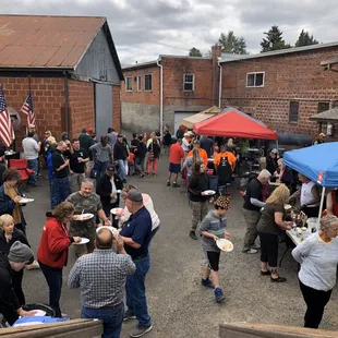 a large group of people eating outside