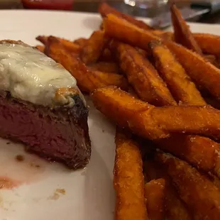 Filet with crumbled blue cheese and sweet potato fries.