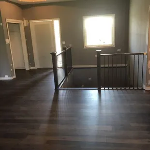 New Construction Install -  Evoke Vinyl Composite Core - color is NEVE