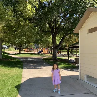 You have to walk to the playground, as there isn't any parking nearby. It's nestled in the trees along a trail and soccer field.