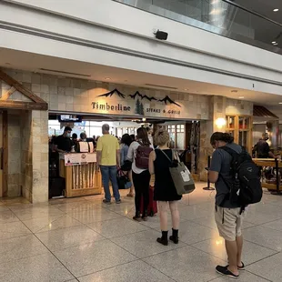 a group of people in a restaurant