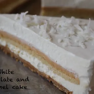 a piece of white chocolate and caramel cake