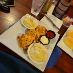 Stuffed shrimp with crab and whipped potatoes.