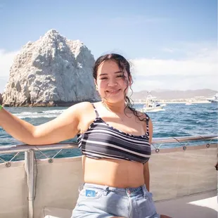 My daughter enjoying the boat ride as we head to pelican rock to go snorkeling.