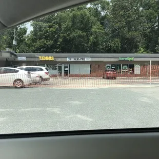 The makeshift barricade he put up, it cuts the parking lot in half.