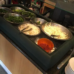 a man preparing food in a restaurant