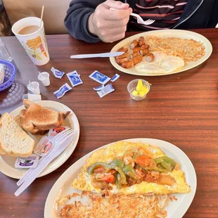 Our breakfast. Spanish Omelette and a #1 Breakfast Special w/ sausage.  Drinks: decaf coffee and hot tea.