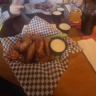 Honey hot wings, tots and honey bbq wings (grilled and re-sauced)
