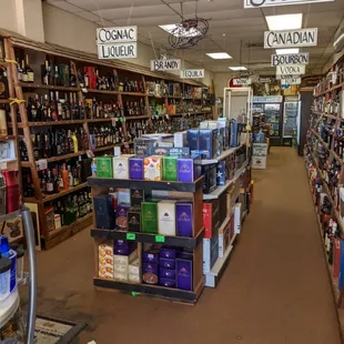 Large selection of spirits, wine and liquor with labeled sections!