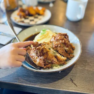 The Little One couldn't keep her fingers off the fried chicken