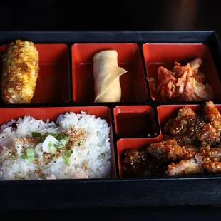 a bento box of food