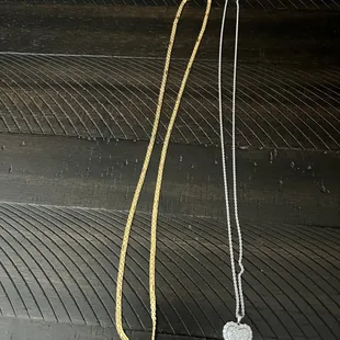On left is the 22k gold necklace that was repaired. On the right is the platinum chain swapped out for the white gold chain with pendant.