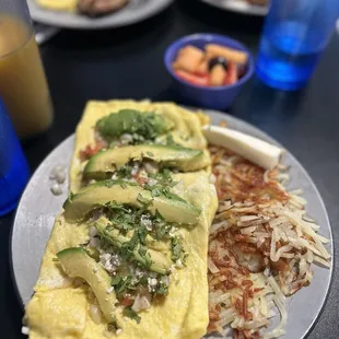 the Green Chilaquiles Omelet with Hashbrowns
