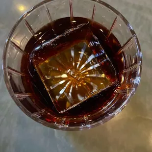 a glass of wine on a table