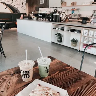 a coffee and a sandwich on a table
