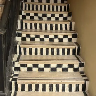 The Interior with the Cool Painted Stairway  @ Timeless Furnishings in Bakersfield CA.