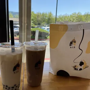 Regular Milk tea with pearls and coffee milk tea with pudding. Dessert to go bag