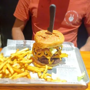 The wizard burger  ridiculously large with one side