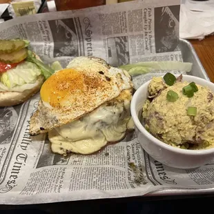 &quot;All jacked up&quot; burger w/ fried egg on top &amp; potato salad.