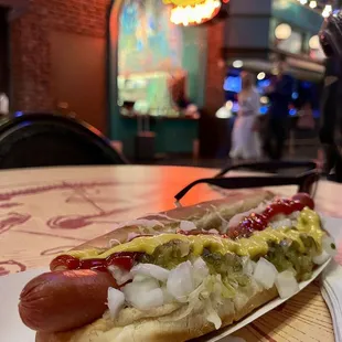 American dog: ketchup, mustard, onions, relish