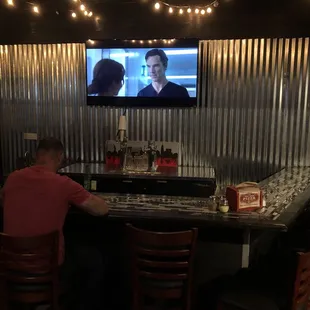 Cool little bar to chill out at while waiting for your food to come.