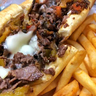 Philly cheese with peppers, onions, and mushrooms.