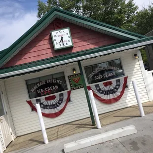 a clock on the front of the building