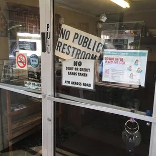 a no public restaurant sign in the window