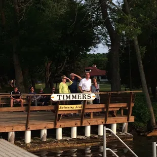 a group of people on a dock