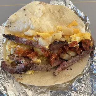 Brisket, Egg &amp; Cheese Taco add Potatoes