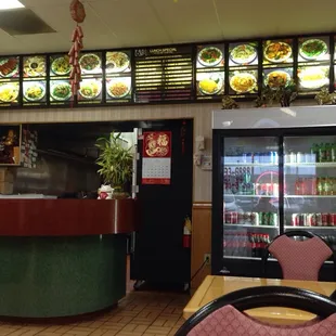 Menu board with generic food photos, like so many others, and front counter where you order, in or out
