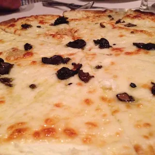 BLACK & WHITE PIZZA - FRESH RICOTTA, MOZZARELLA AND PROVOLONE WITH SHAVED BLACK TRUFFLES