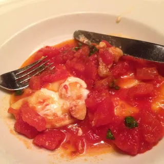 BURRATA RAVIOLI WITH FRESH TOMATO, CHILI FLAKES, OLIVE OIL, GARLIC AND BASIL