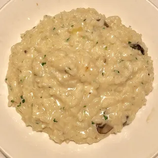 CREAMY RISOTTO WITH WILD MUSHROOMS AND BLACK TRUFFLES