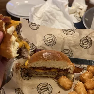 a burger and tater tots