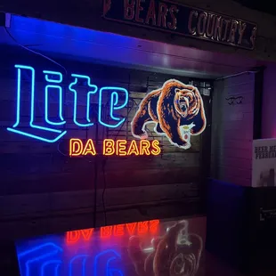 a neon sign of a bear