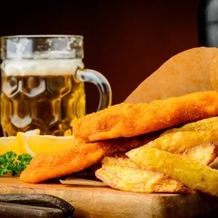 fish and chips on a cutting board