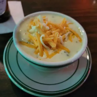 a bowl of soup on a plate