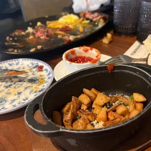 Side of potatoes does not come with Benedict