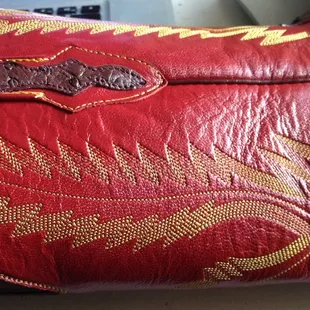 Stitching disappears into leather.