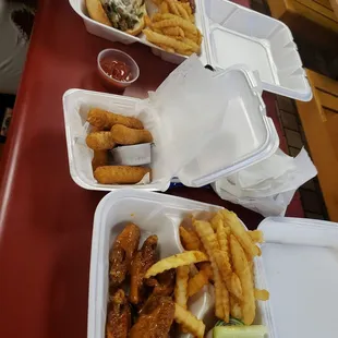 Gold wing combo and Philly sandwich combo with cheese sticks