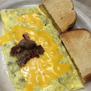 Trio Omelette (Sausage, Ham, Bacon) $5.95...