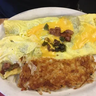 All the way aka everything omelette and hash browns