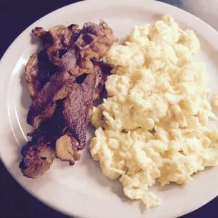 The bacon and eggs to accompany the French toast