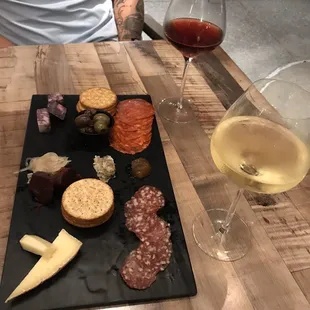 Charcuterie board with wine