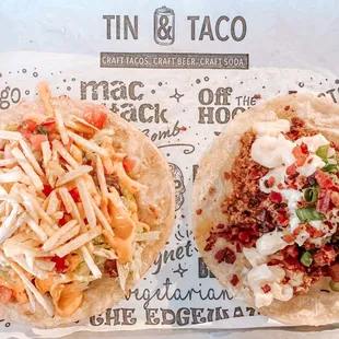 two tacos with toppings